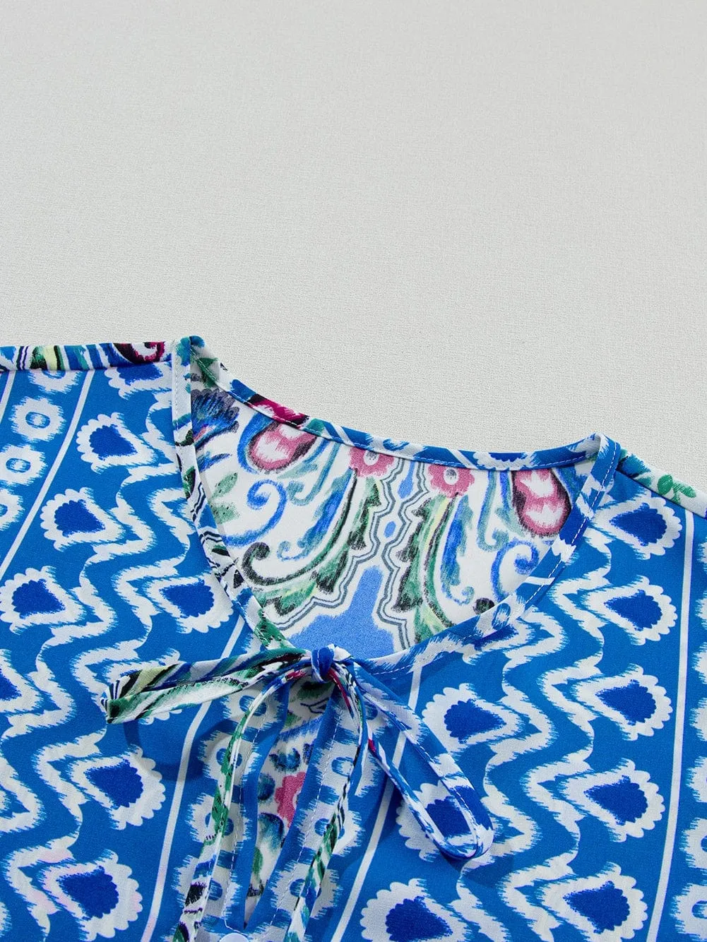 Boho Chic Sky Blue Floral Print Mini Dress with Tie Neck